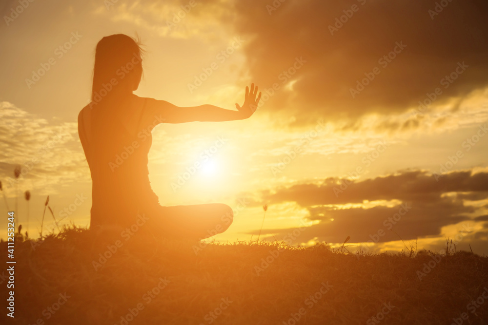 Young woman raise hands up for her success, Concept of Success in life.