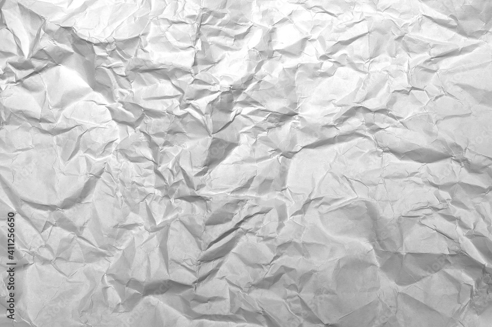 Fototapeta premium Paper background. Crumpled gray paper