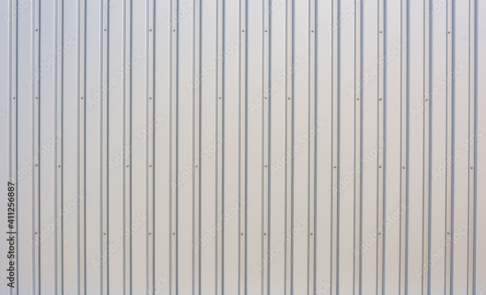 Texture of a corrugated sheet metal aluminum facade Texture of a corrugated sheet metal aluminum facade