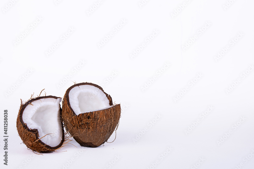 Cracked Coconuts on White Background
