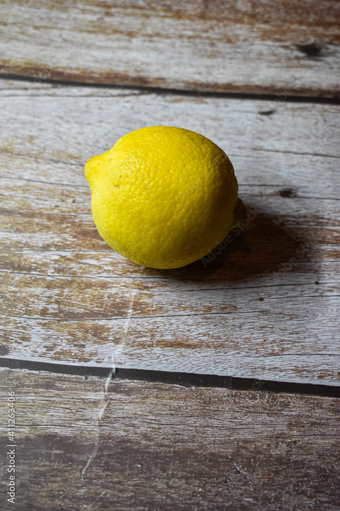 Lemon on wooden background