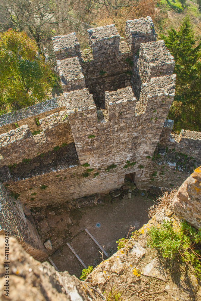 view on stone tower and wall of an old castle