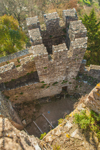 view on stone tower and wall of an old castle