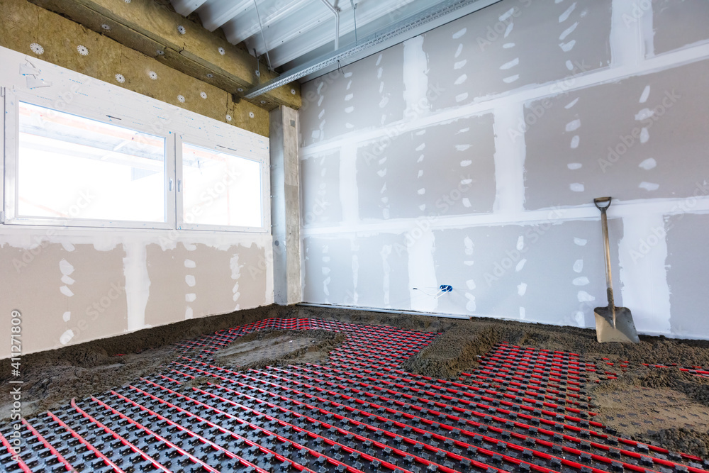 Naklejka premium Floor heating in a new building. Interior design and finishing industry