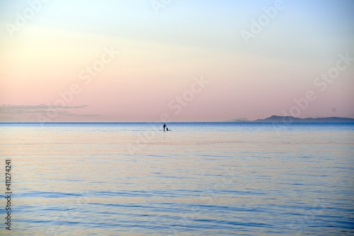 paddle boarding at sunset © Murray