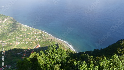 Spectacular aerial views of the lush shores of a Vocanica island