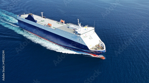 Aerial drone photo of Roll on Roll off vehicle carrier vessel (RO RO) cruising in Aegean deep blue sea, Greece © aerial-drone