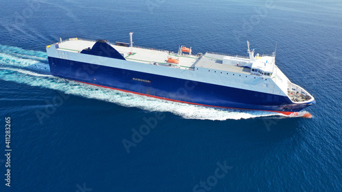 Aerial drone photo of Roll on Roll off vehicle carrier vessel (RO RO) cruising open ocean Mediterranean deep blue sea © aerial-drone