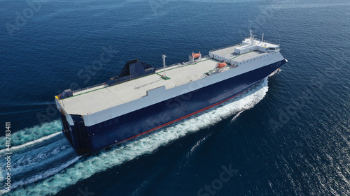 Aerial drone photo of Roll on Roll off vehicle carrier vessel (RO RO) cruising in Aegean deep blue sea, Greece © aerial-drone