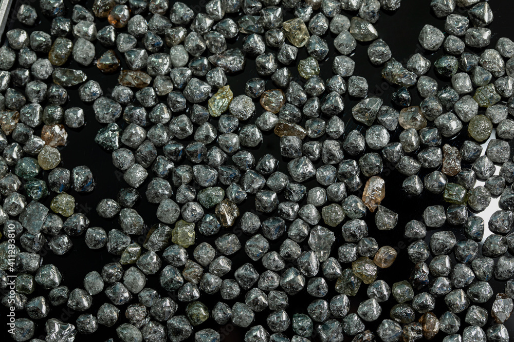 Natural Rough diamonds on black background sorted by size and shapes . High quality photoNatural Natural Rough diamonds on black background sorted by size and shapes . High quality photoNatural