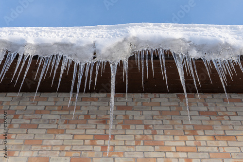 icicles hanging from a roof