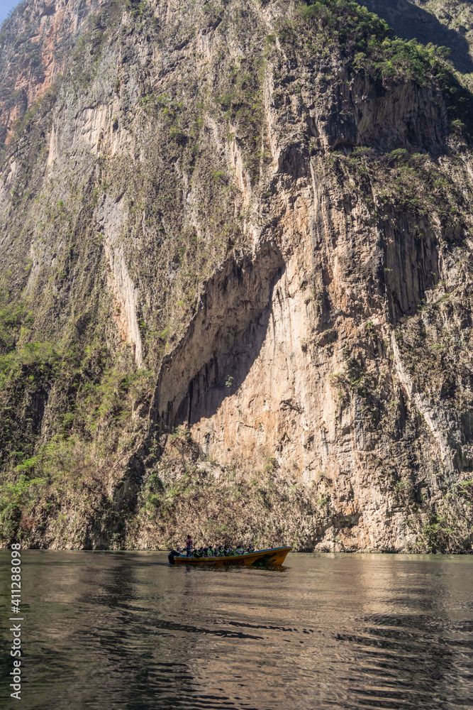 Motorboat in the river of a canyon. Sumidero Canyon in Chiapas, Mexico