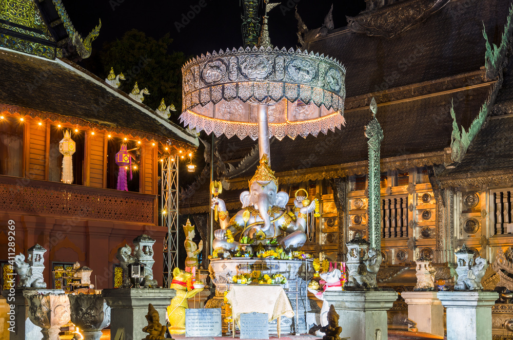 Ganesha statue at Wat Sri Suphan or Silver Temple at night, Chiang Mai, Thailand