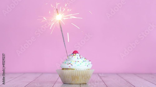 Wallpaper Mural Burning fire candle on testy sweet cup cake with white cream Torontodigital.ca