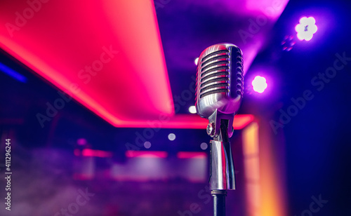 Close-up Retro vintage microphone on blurred multicolored background