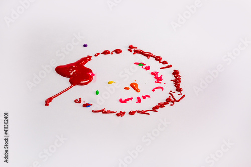 .Colors drop onto a spinning white background. The color of the drops is a circular halo