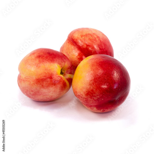 Sweet peaches fruit half isolated on white background.