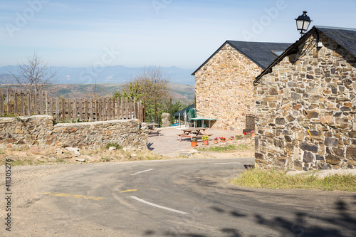 a paved road entering El Acebo de San Miguel village (municipality of Molinaseca), El Bierzo, province of Leon, Castile and Leon, Spain photo