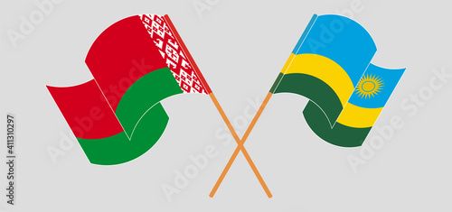 Crossed and waving flags of Belarus and Rwanda