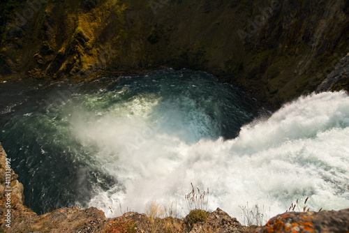 At the brink of the Upper Falls of the Yellowstone River in Yellowstone National Park