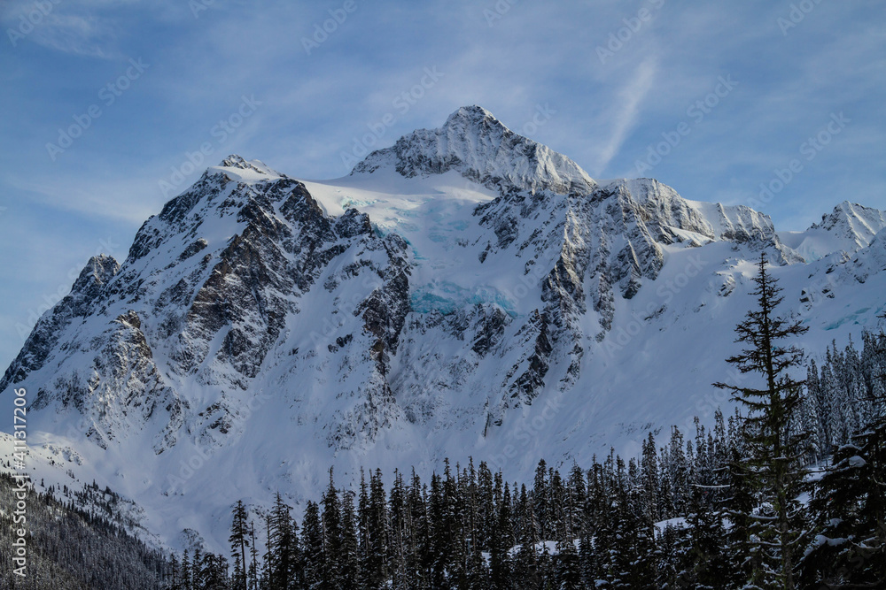 An image of Mt Shusksan in the North Cascade Mountains covered in snow.