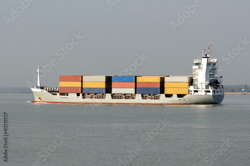 Feeder container ship loaded with containers