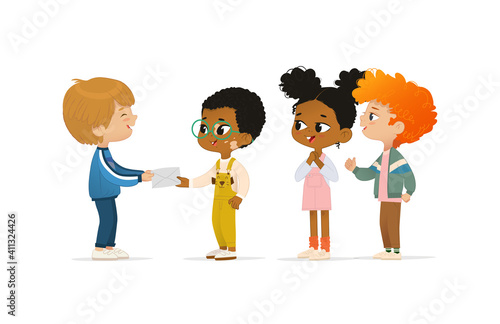 Blond boy give an envelope to his friend. Multicultural children children look at them happily.