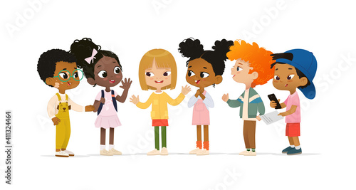 Group of Multicultural children talk to each other. School boy with vitiligo say hello to new friends. Asian boy scan QR code. School friends have fun