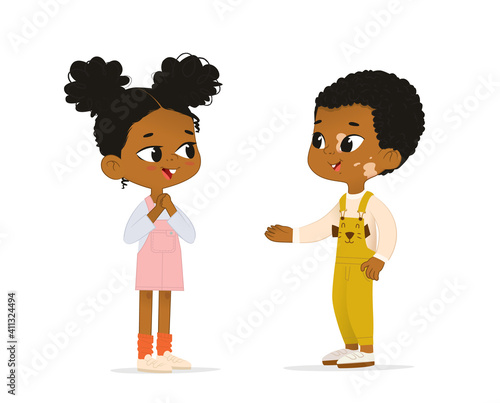 Two African American children talk to each other. School boy with vitiligo say hello to his new friend. Boy abd Girl School friends have fun