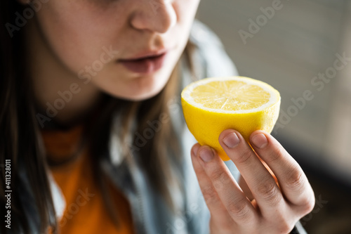 Woman Nose Sniffing Lemon Smell