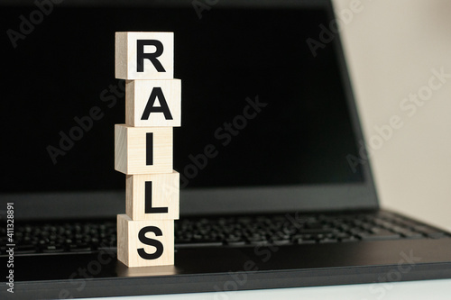 The word RAILS in wooden cubes on the keyboard