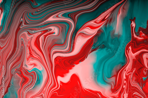 Abstract green and red background,looks like malachite.Make up concept.Beautiful stains of liquid nail laquers.Fluid art,pour painting technique.Good as digital decor,copy space.