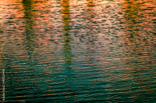 Abstract impressionist patterns on the surface of water 