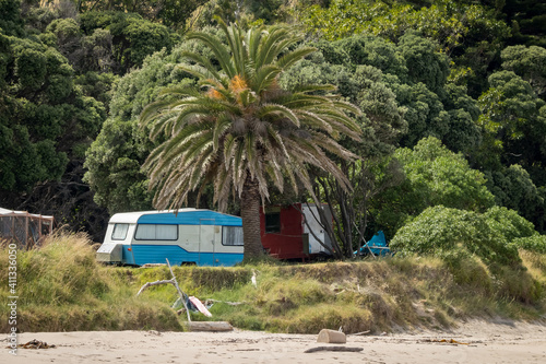 Summer freedom camping, Pouawa, East Coast, North Island, New Zealand  photo
