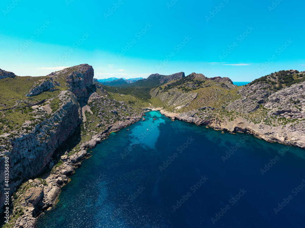 Panoramic drone picture of beach between the mountains in Mallorca