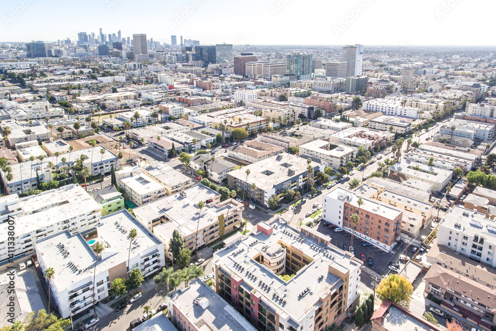 Drone Aerial Afternoon View from Wilton Pl and W 5th St toward Los Angeles LA Downtown above Koreatown on January 12, 2021