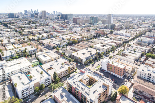 Drone Aerial Afternoon View from Wilton Pl and W 5th St toward Los Angeles LA Downtown above Koreatown on January 12, 2021 photo
