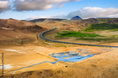Aerial view on road in Iceland. Aerial landscape above highway in the geysers valley. Icelandic landscape from air. Famous place. Travel and vacation image