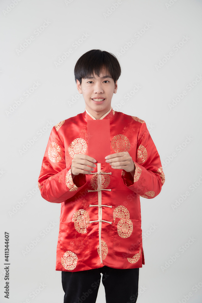 Chinese man with mandarin holding red envelope Chinese man with mandarin holding red envelope