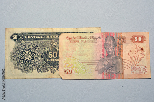 Egyptian 50 piasters banknotes collection, half a pound Egyptian money currency close up. an old banknote versus an older one photo