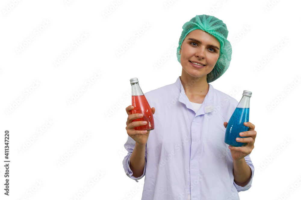 Portrait Caucasian female in laboratories form with red and blue juice buttles on hand with isolate background Portrait Caucasian female in laboratories form with red and blue juice buttles on hand with isolate background