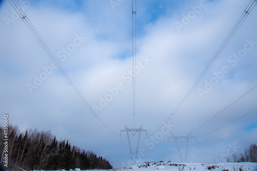 Electricity pylon under winter sky