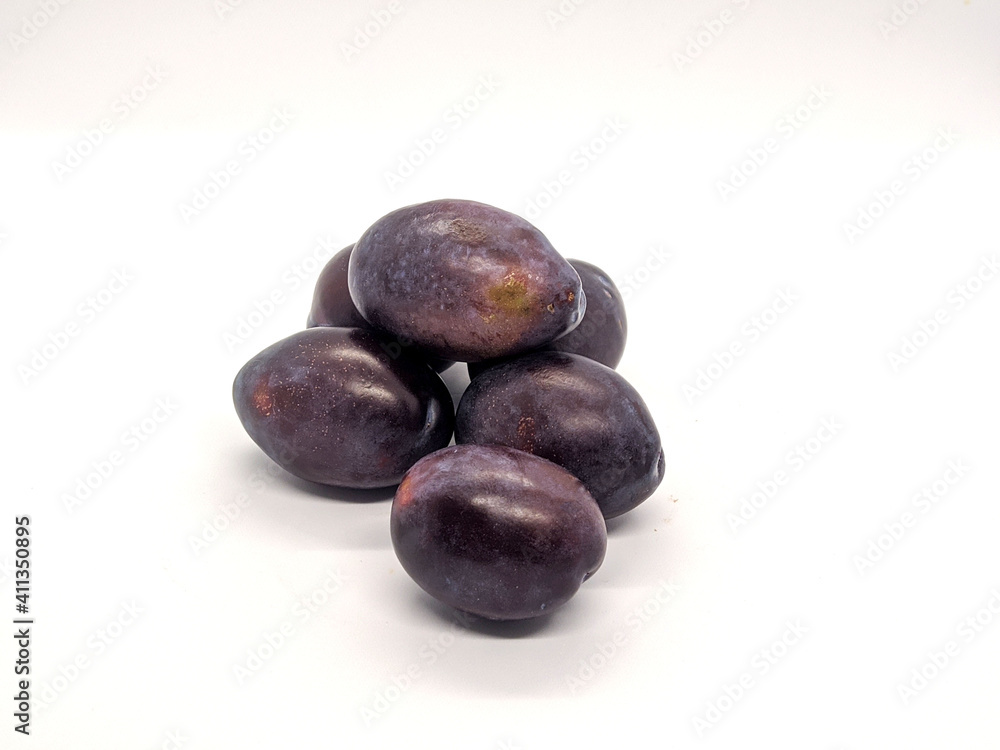 plums. plums on a white background side view plums. plums on a white background side view