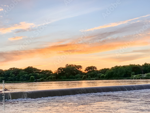 Orange and Blue Sunset over Nebraska Loup river . High quality photo