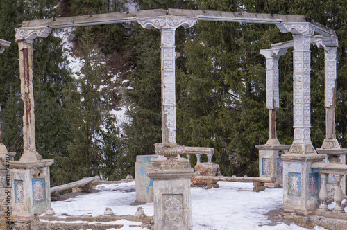 An old gazebo destroyed by time in the mountains.