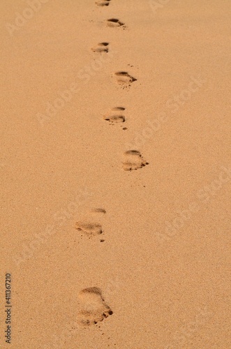 A single footprint in the sand