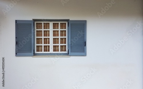 window white blue isolated in white wall open leaves
