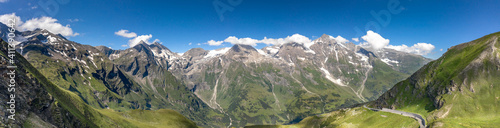 Panoramic aerial view of Grossglockner mountain range covered in snow in summer Austria