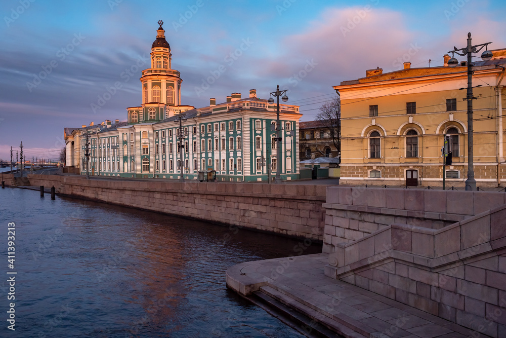 Fototapeta premium Kuntskamera in Saint Petersburg. Summer day in Russia. Kuntskamera on blue sky background. City landscape of Saint Petersburg. Travel across Russia. Tour in St. Petersburg. Museums of Russian cities