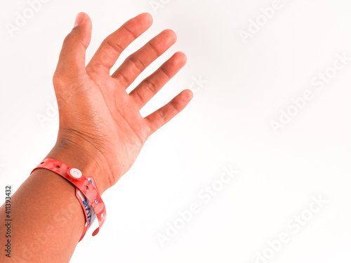 Malaysia patients who are positive covid-19 will wear a wristband during the quarantine period. Selective focus.